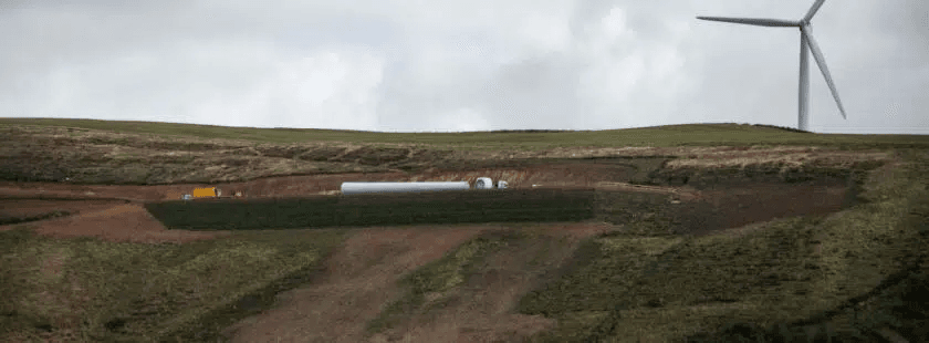 Steep slope platform reinforced using StrataGrid™ uniaxial geogrid and StrataSlope™ systems on a mountain edge