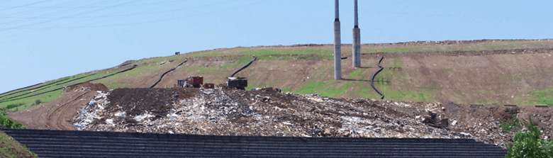 Reinforced soil structure for landfills with StrataSlope® System